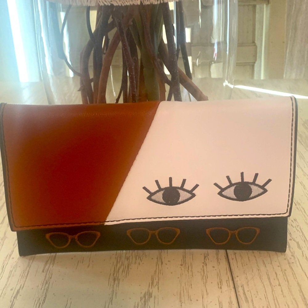 Super cute Tura leather glass holder